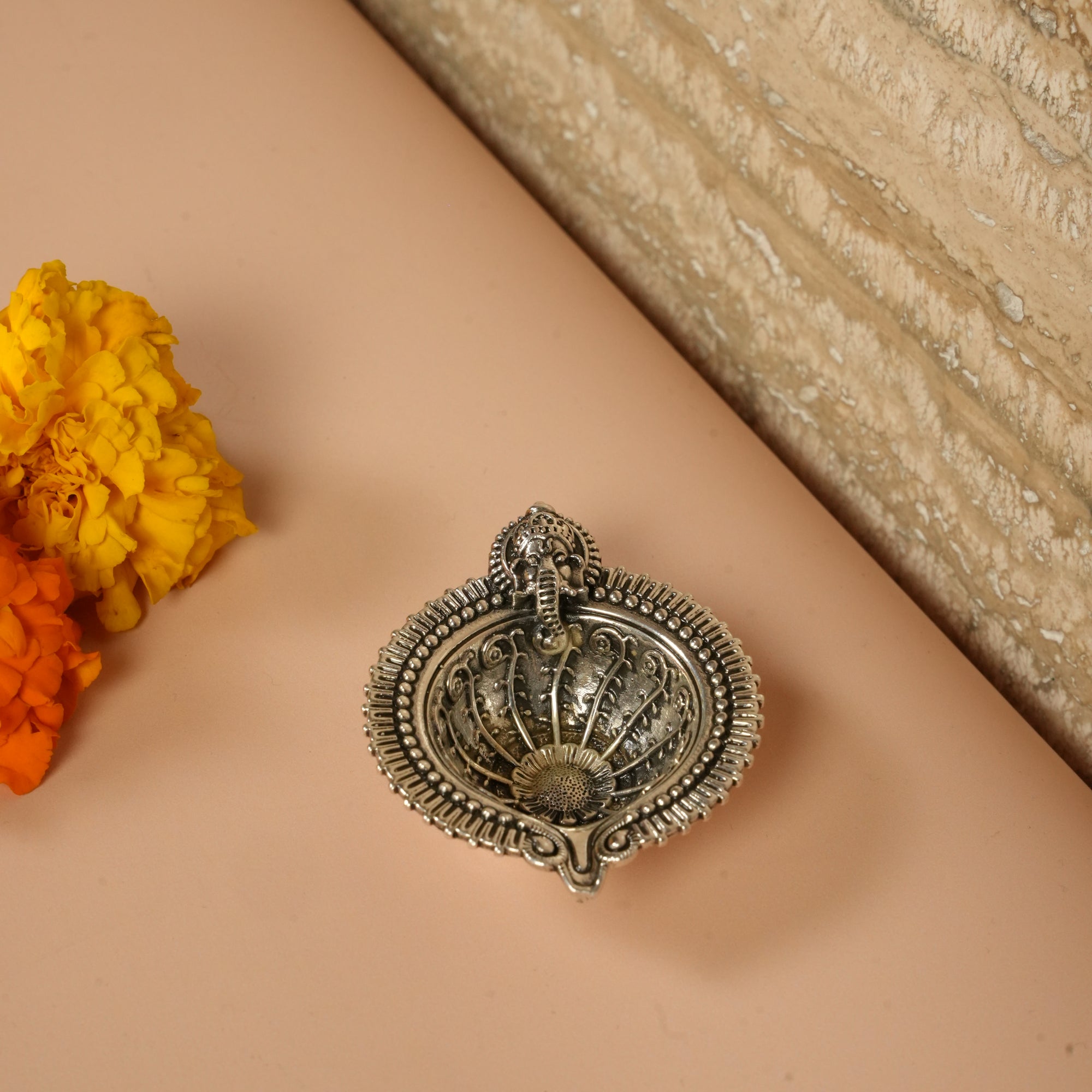 Diya with Lord ganesha symbol