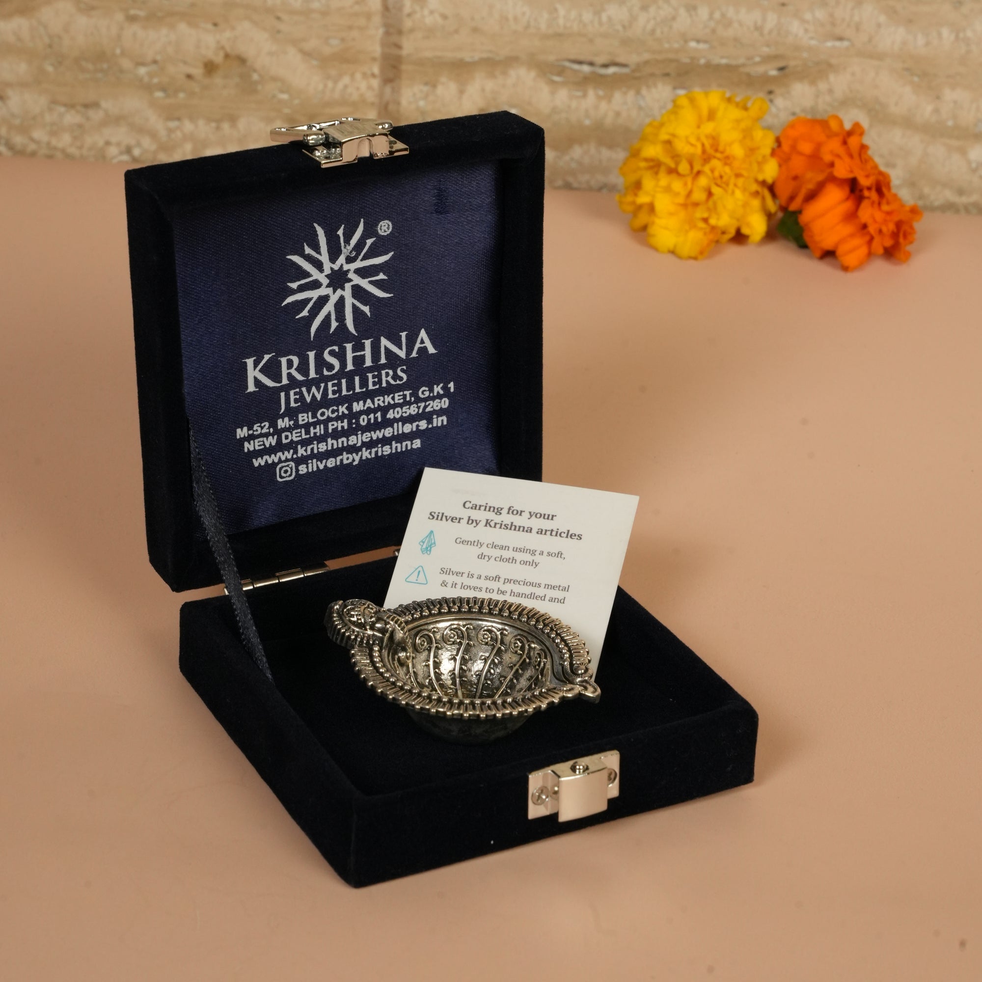 Diya with Lord ganesha symbol