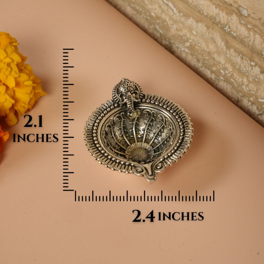 Diya with Lord ganesha symbol